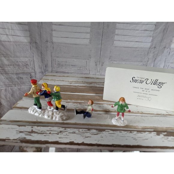 Dept 56 51713 Crack the whip ice skater snow villa